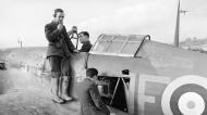 Asisbiz Hurricane Is RAF 601Sqn testing the VHF at Exeter Devon Nov 1940 IWM CH1636a