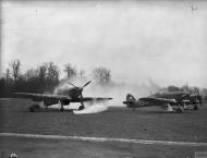 Asisbiz Hurricane I RAF 87Sqn simulating a attack Lille Seclin France Mar 1940 IWM C1152