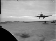 Asisbiz Fleet Air Arm 885NAS Sea Hurricane passes over the deck of HMS Victorious IWM A10221