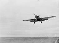 Asisbiz Fleet Air Arm 885NAS Sea Hurricane passes over the deck of HMS Victorious IWM A10222