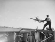 Asisbiz Fleet Air Arm Sea Hurricane L landing aboard HMS Avenger 27th Jun 1942 IWM A10971