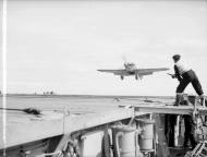 Asisbiz Fleet Air Arm Sea Hurricane landing aboard HMS Avenger 27th Jun 1942 IWM A10979