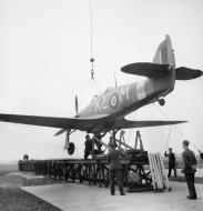 Asisbiz MSFU Sea Hurricane I KEM Z4936 being lowered onto a training catapult at Liverpool IWM 01