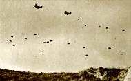 Asisbiz Unternehmen Merkur German paratroopers jumping From Ju 52s over Crete May 1941 IWM E3265E