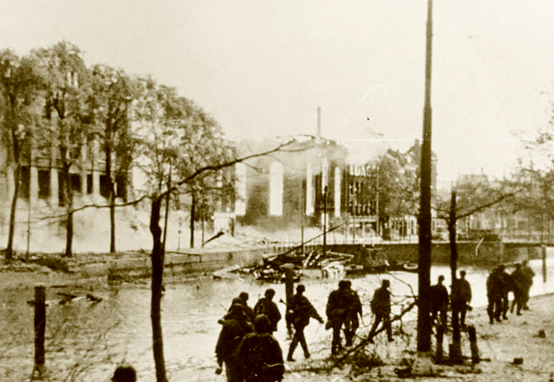 Fall Gelb German troops advance through a destroyed section of Rotterdam Holland May 1940 Bund 01