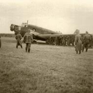 Asisbiz Junkers Ju 52 transport being lifted by German soldiers 02