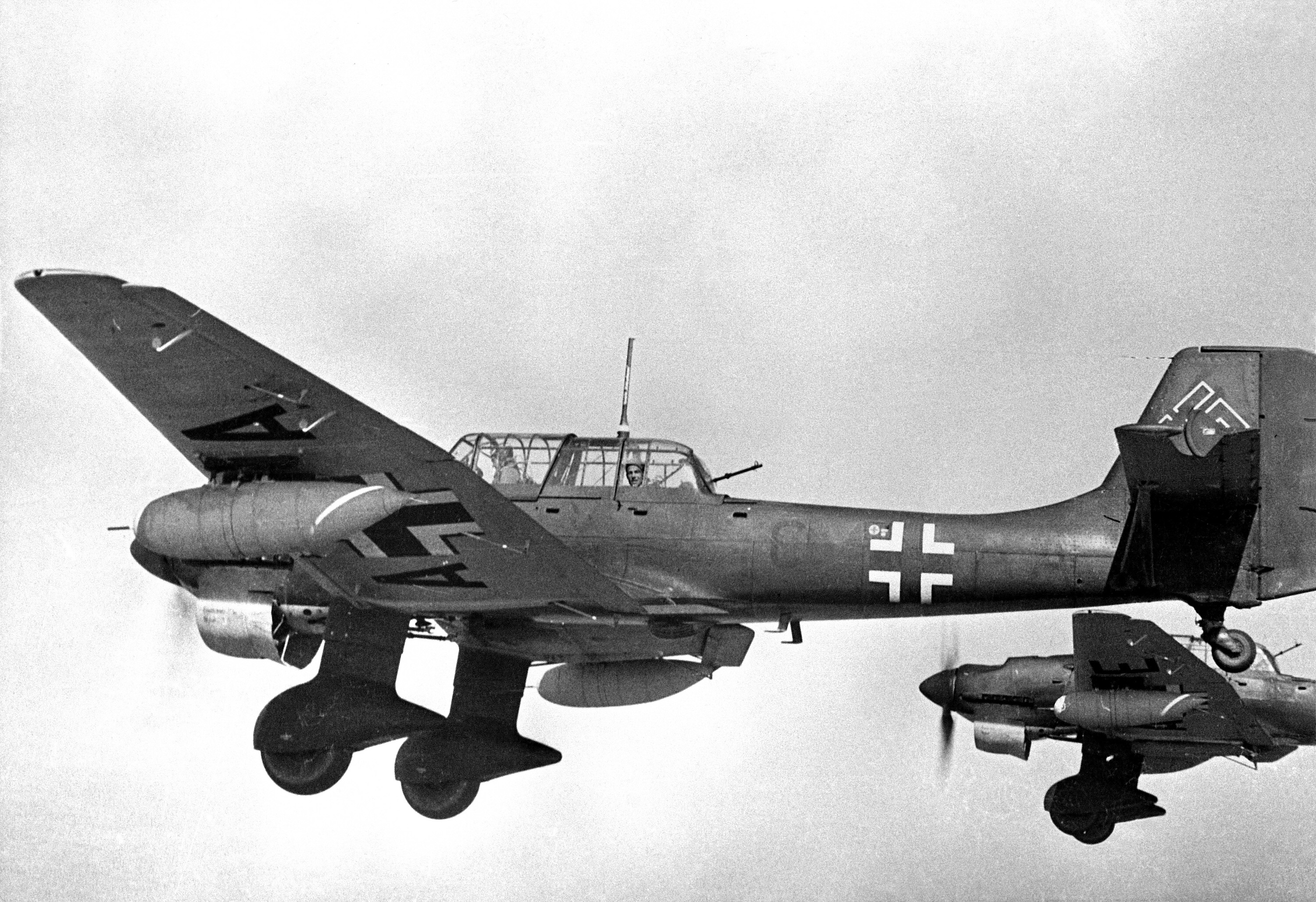 Aircrew Italian pilots ferrying newly delivered Ju 87R Stammkennzeichen code Stkz CM+AA and CM+AE 01