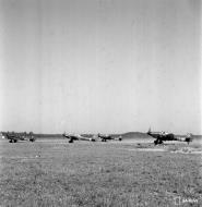 Asisbiz Junkers Ju 87D5 Stuka 3.SG3 S7+HL w S7+FL S7+NL n 1.SG3 S7+AH taxing Immola 28th Jun 1944 01