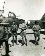Asisbiz Junkers Ju 87R2 Stuka Stab I.StG2 T6+AB Kurt Kuhlmey receives flowers in North Africa 01