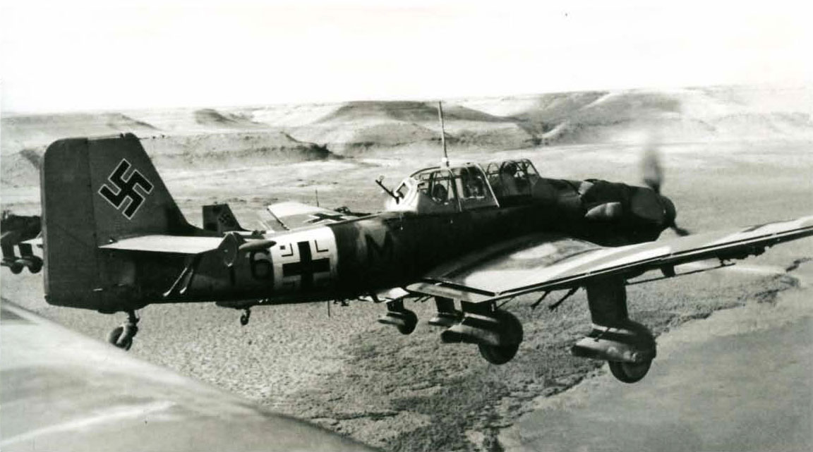 Junkers Ju 87R2 Stuka 4.StG2 (T6+JM) tight formation Mediterranean coastline over North Africa 01