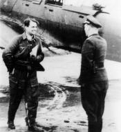 Asisbiz Aircrew Luftwaffe Stuka pilot Helmut Bruck greeted by Gohmann after 900 sortie to Lemberg Poland 01