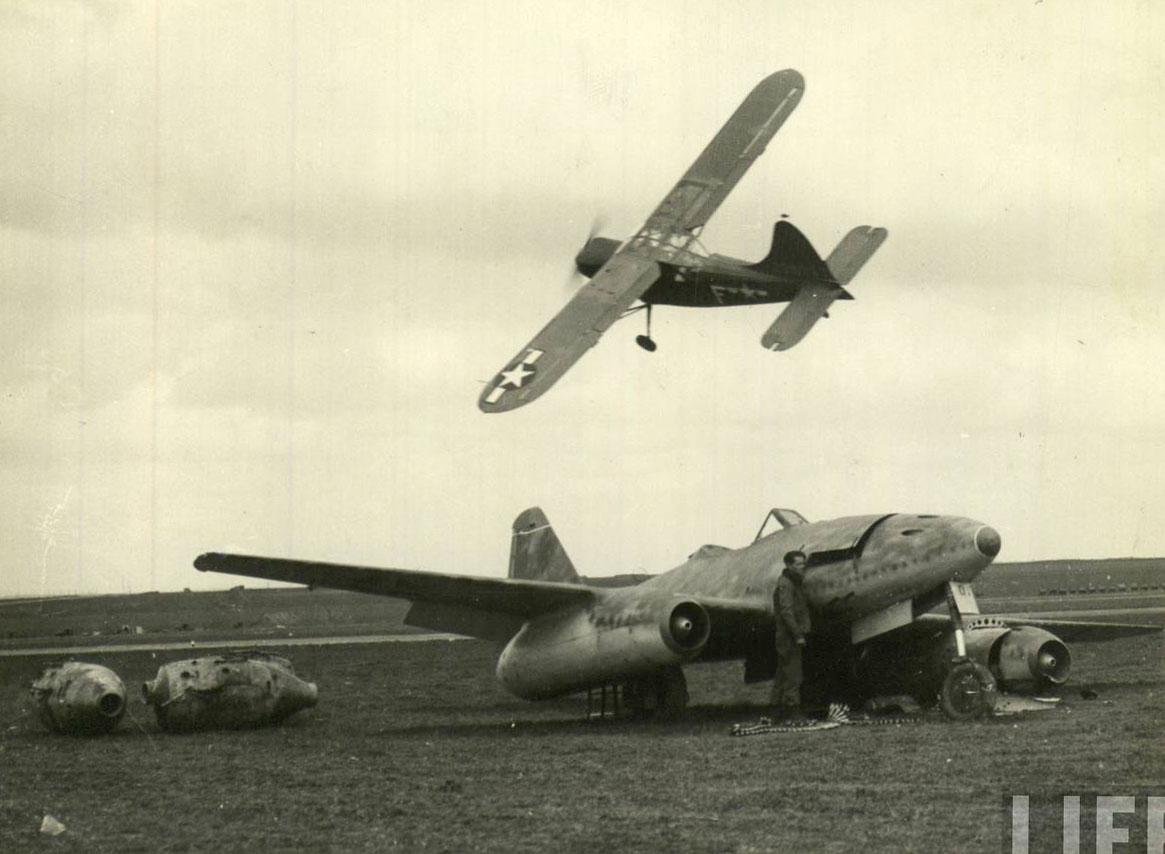 Messerschmitt Me 262 being buzzed by a Stinson L 5 Sentinel