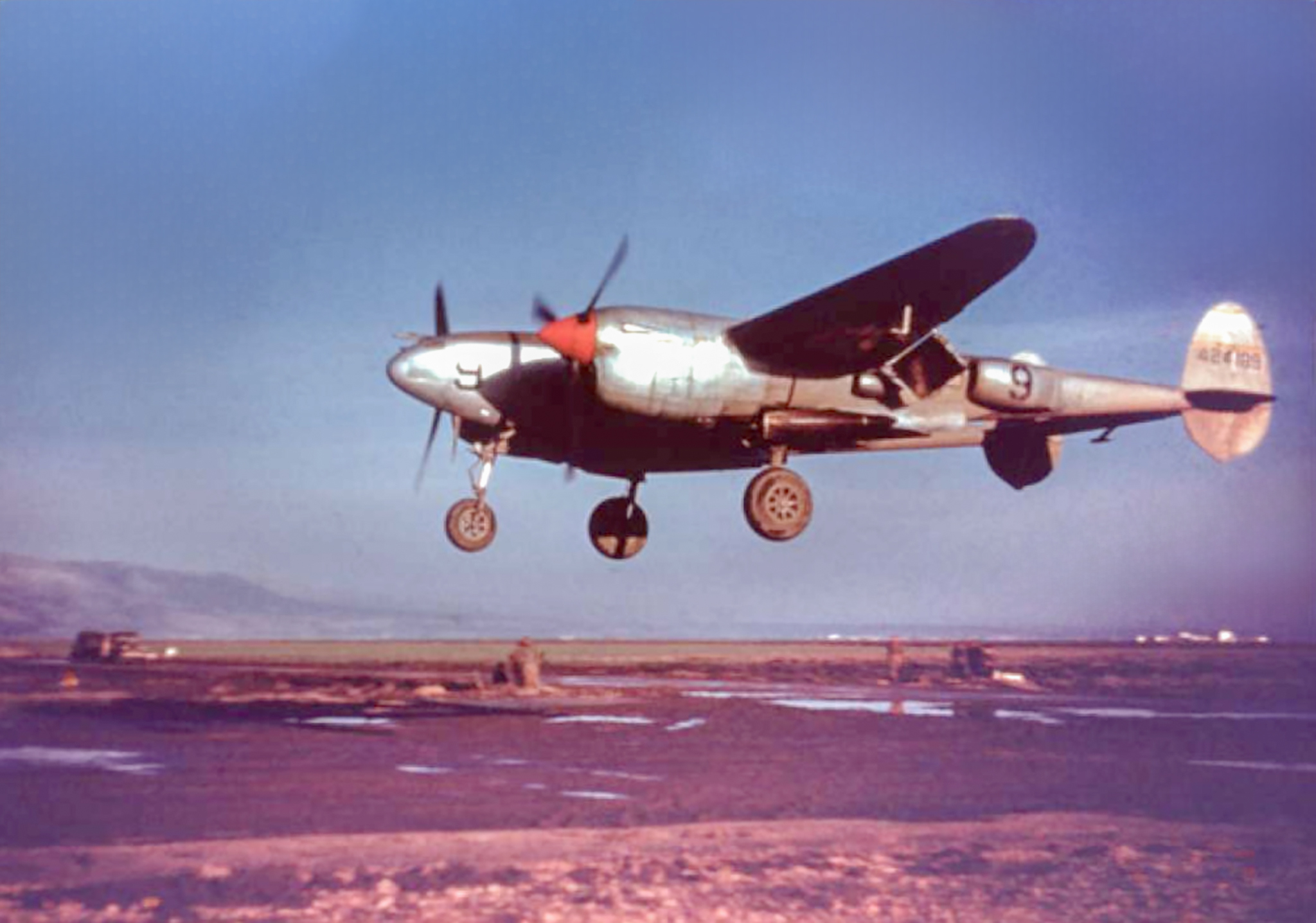 44-24189 P-38L Lightning 14FG37FS just about to touch down at Triolo Italy the home of the 14th Fighter Group 1944