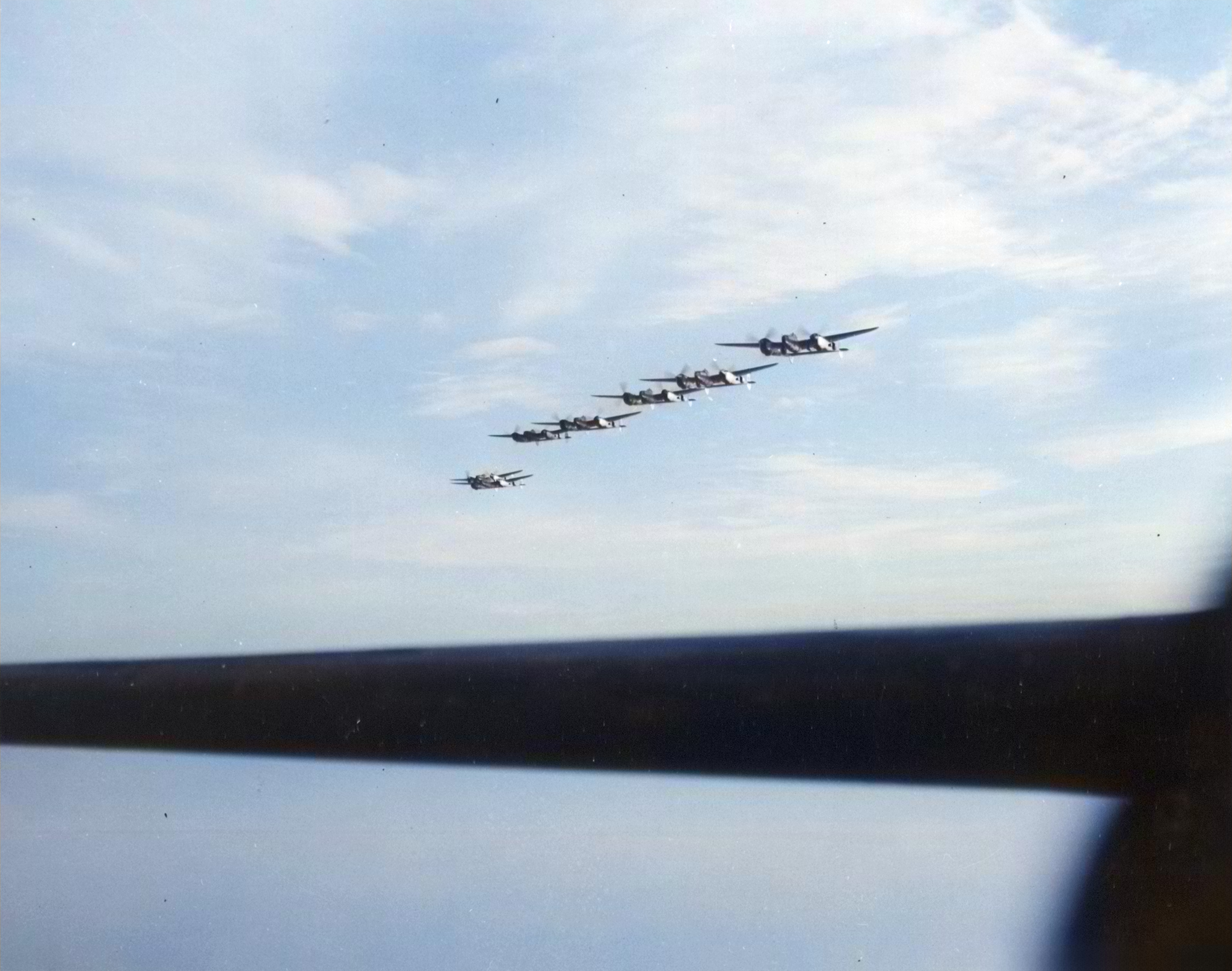Formation of P-38 Lightnings from 1FG94FS guarding a B 17 Fortress during escort mission somewhere over Italy 15th June 1944 02