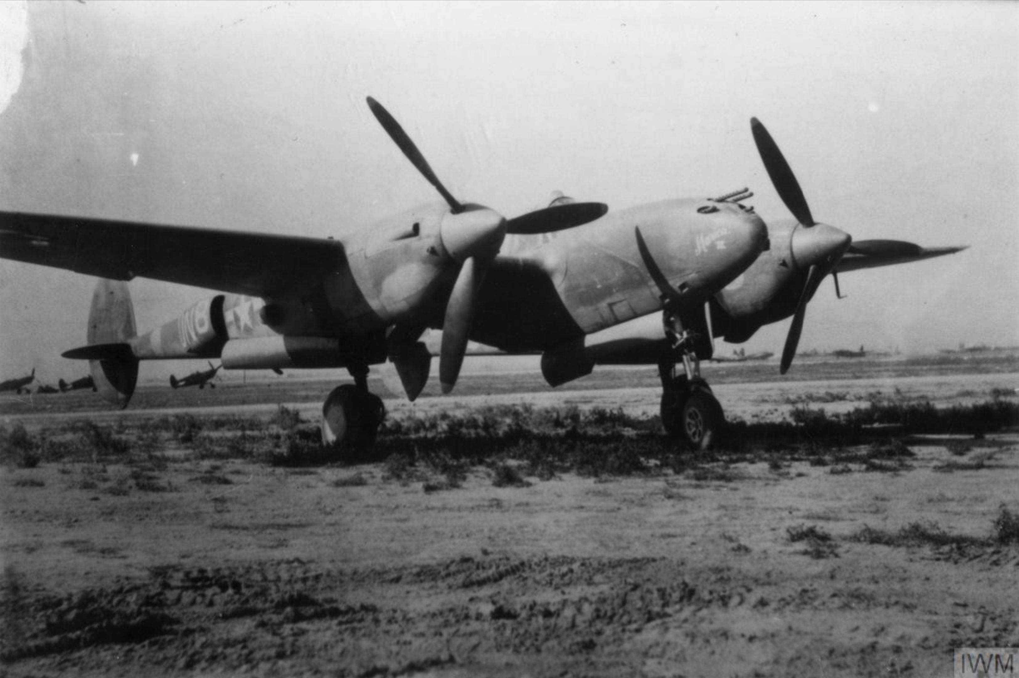 Lockheed P-38 Lightning 12AF 1FG94FS UNB Marion III nose art left side North Africa FRE8802