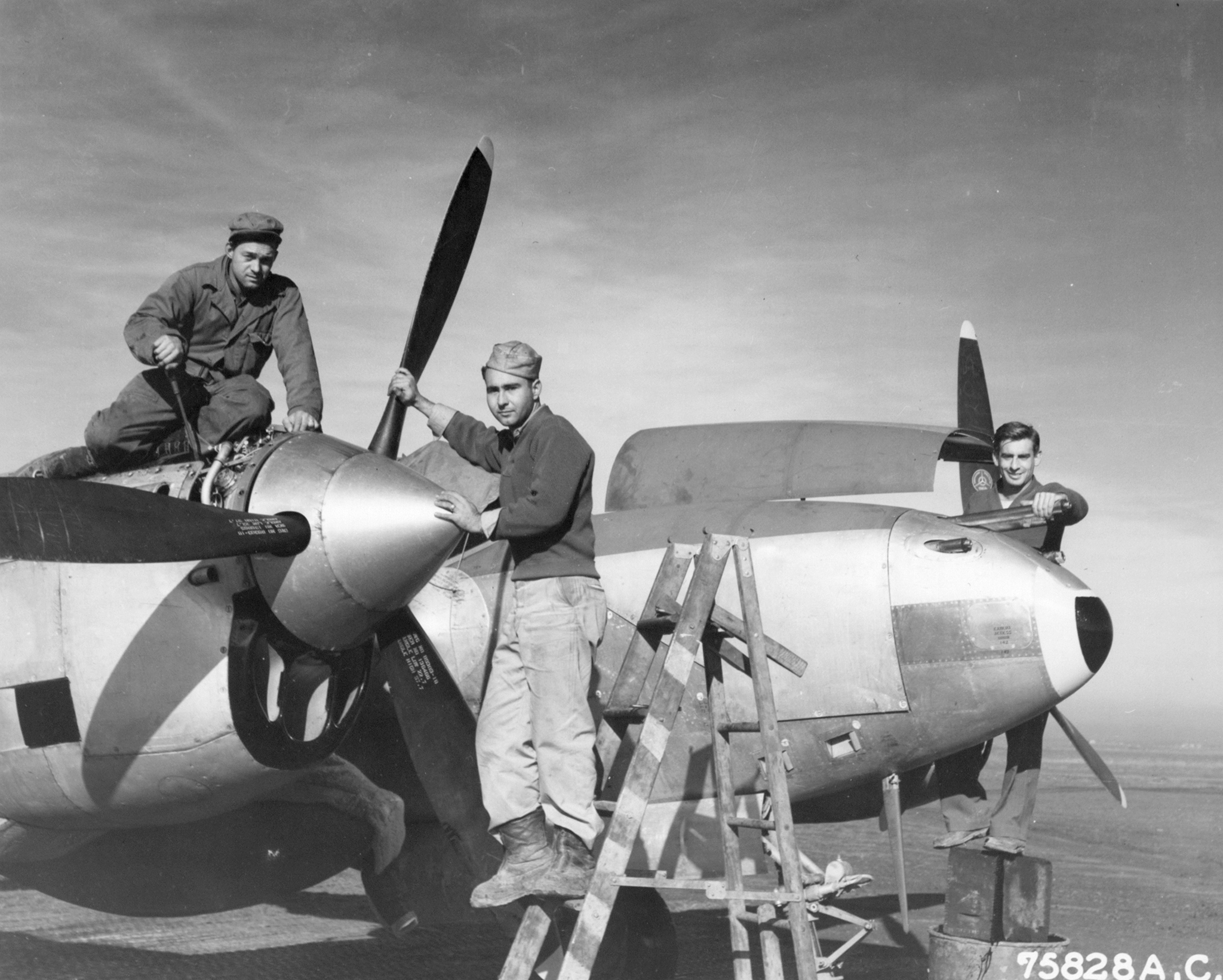 Lockheed P-38 Lightning 15AF 1FG94FS ground crew undergoing maintenance at an airfield somewhere in Italy 1944 02