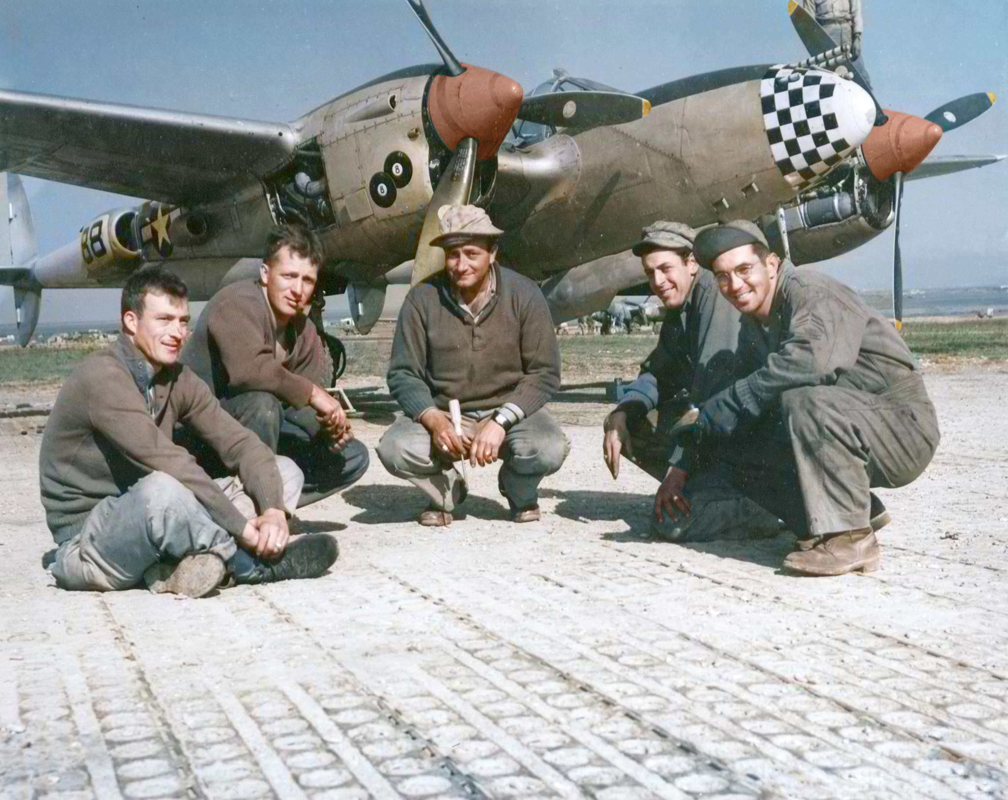 Lockheed P-38 Lightning 15AF 1FG94FS named 88 with ground crew at an airfield somewhere in Italy 1944 01