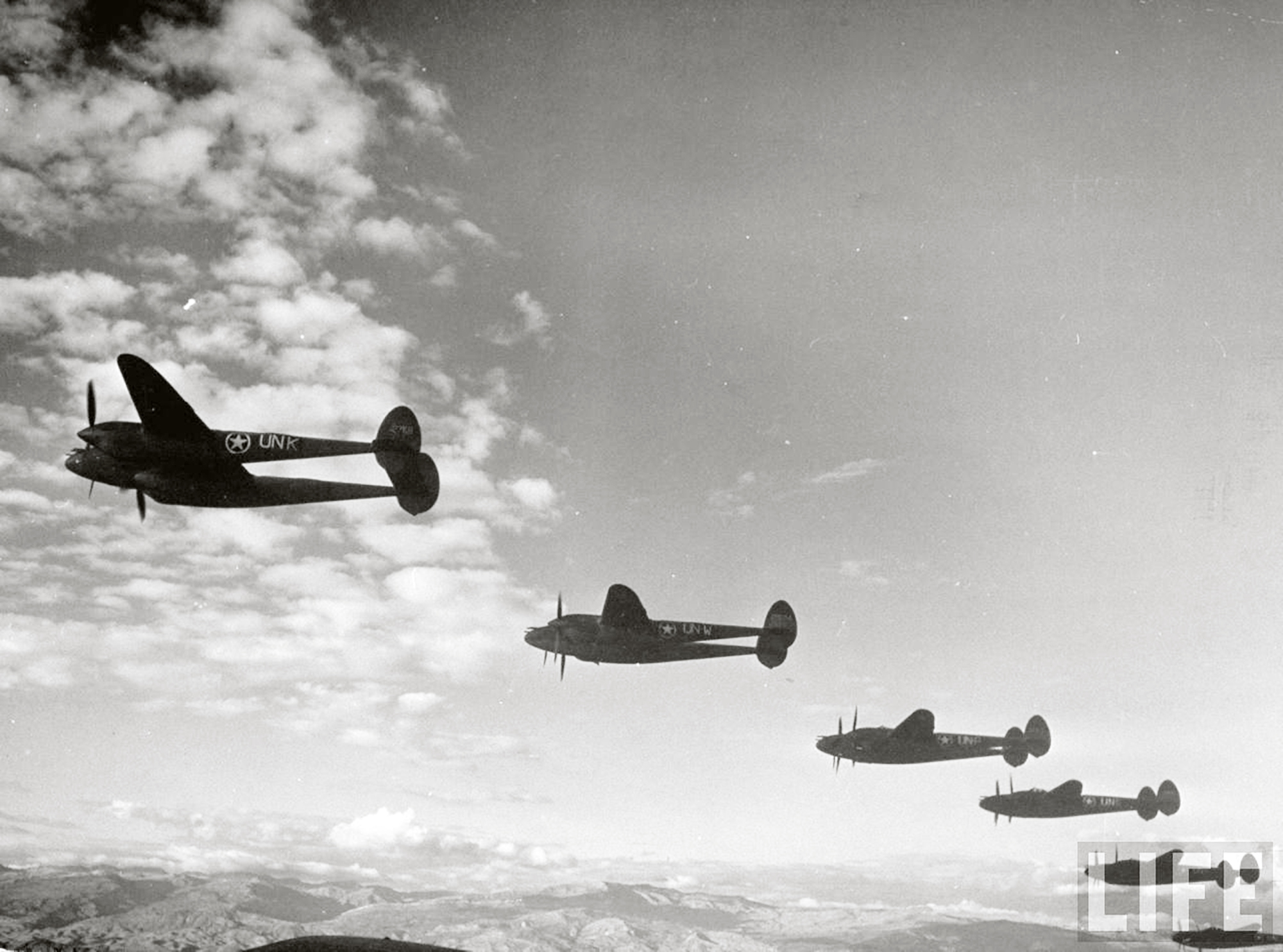 Lockheed P-38 Lightnings 12AF 1FG94FS UNK with UNW escorting bombers to El Aliuna airbase Tunis Mar 1943 01