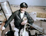 Asisbiz A 1FG94FG pilot poses next to his P-38 Lightning whilst based in Italy 1944 01