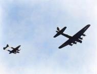 Asisbiz Lockheed P-38 Lightning 15AF 1FG escorts a B 17G Fortress during a raid over Italy 1944 01