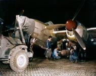 Asisbiz Lockheed P-38 Lightning 15AF 1FG94FS being loaded up for a bombing mission when based in Italy 1944 01
