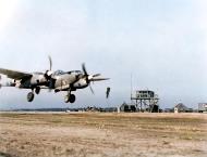 Asisbiz Lockheed P-38J Lightning named Droop Snoot 8AF 20FG55FS KIC trsfd 370FG402FS taking off on a recon mission Luxemburg 10th April 1945 01