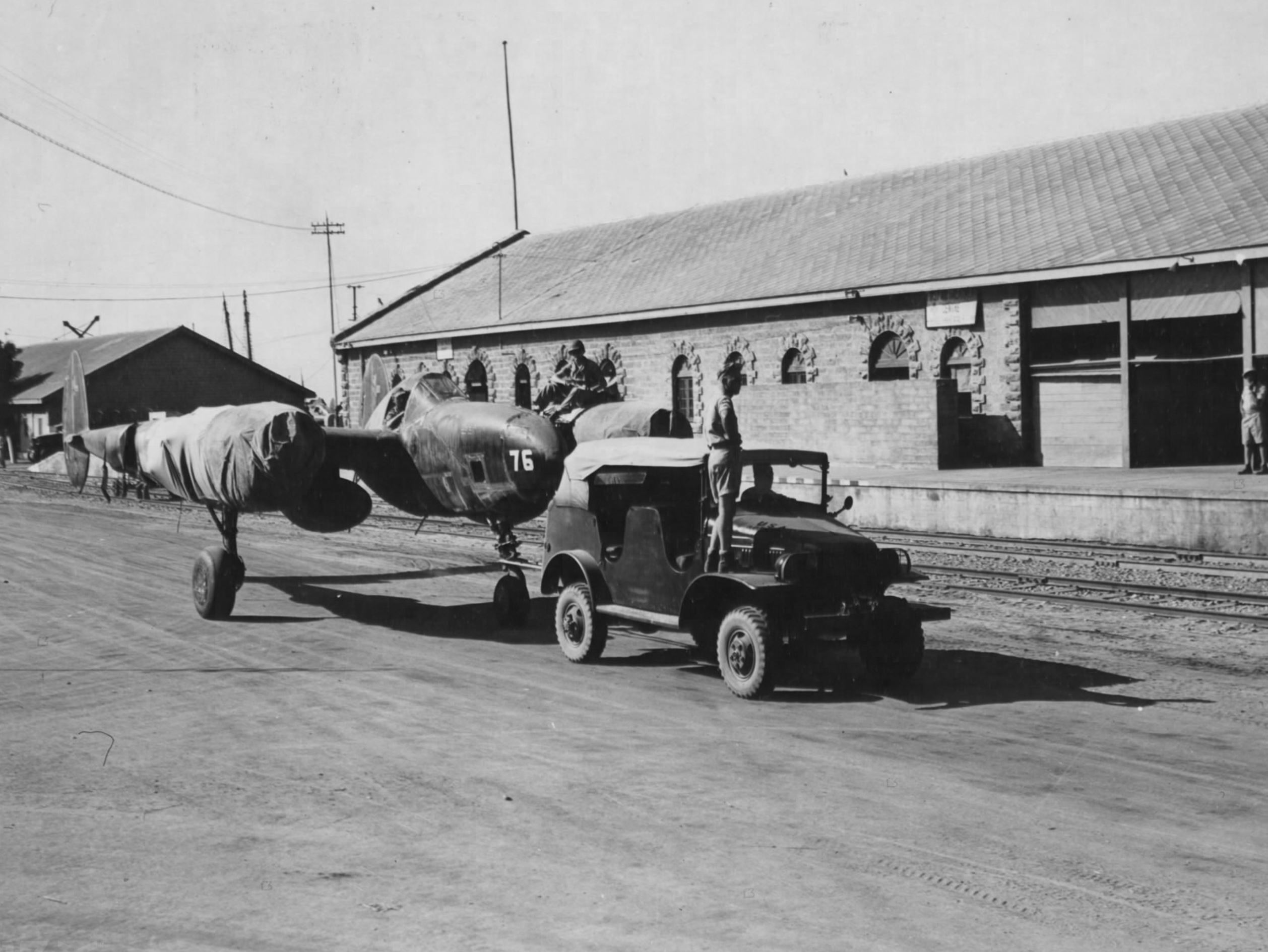 Lockheed F 4 Lightning being moved from the docks to the assembly area Karachi India 01