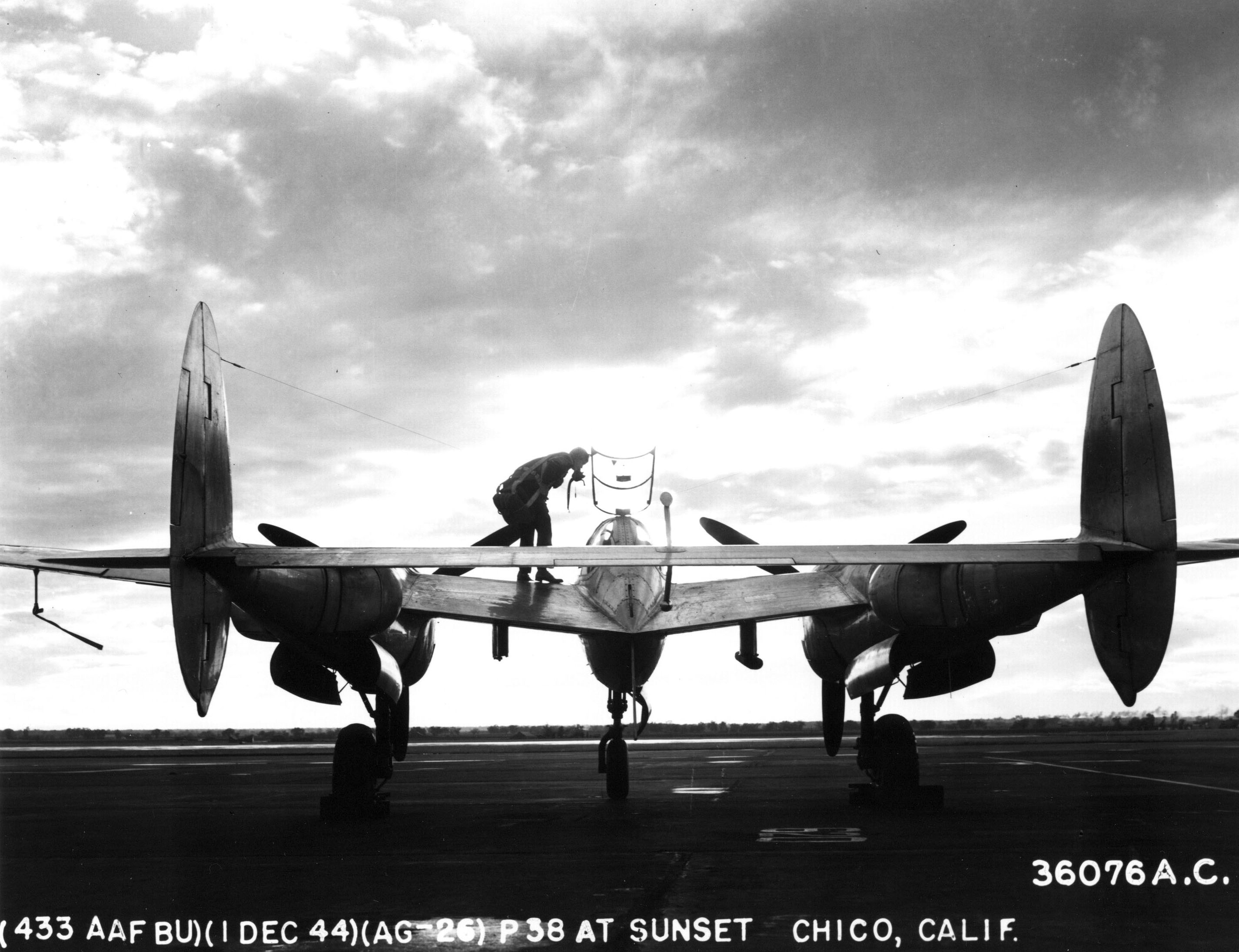 Lockheed P-38 Lightning silhouette seen from behind during a Californian sunset Dec 1944