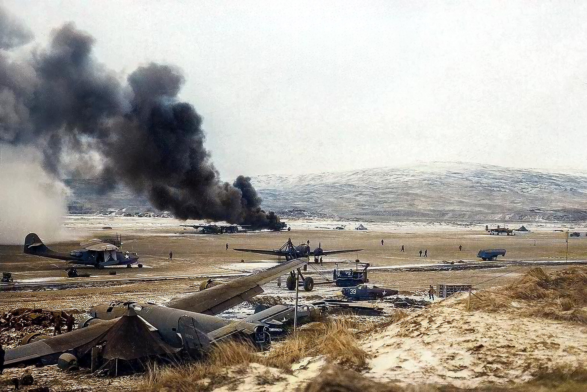 P-38 Lightning 343FG54FS crash at Adak on the left is the remains of 41 1092 B 24D Liberator 11AF 28BG wrecked on the 30th Sep 1942 01