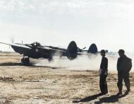 Asisbiz Lockheed F-5 Lightning takes off from a desert strip North Africa 1943 NA772