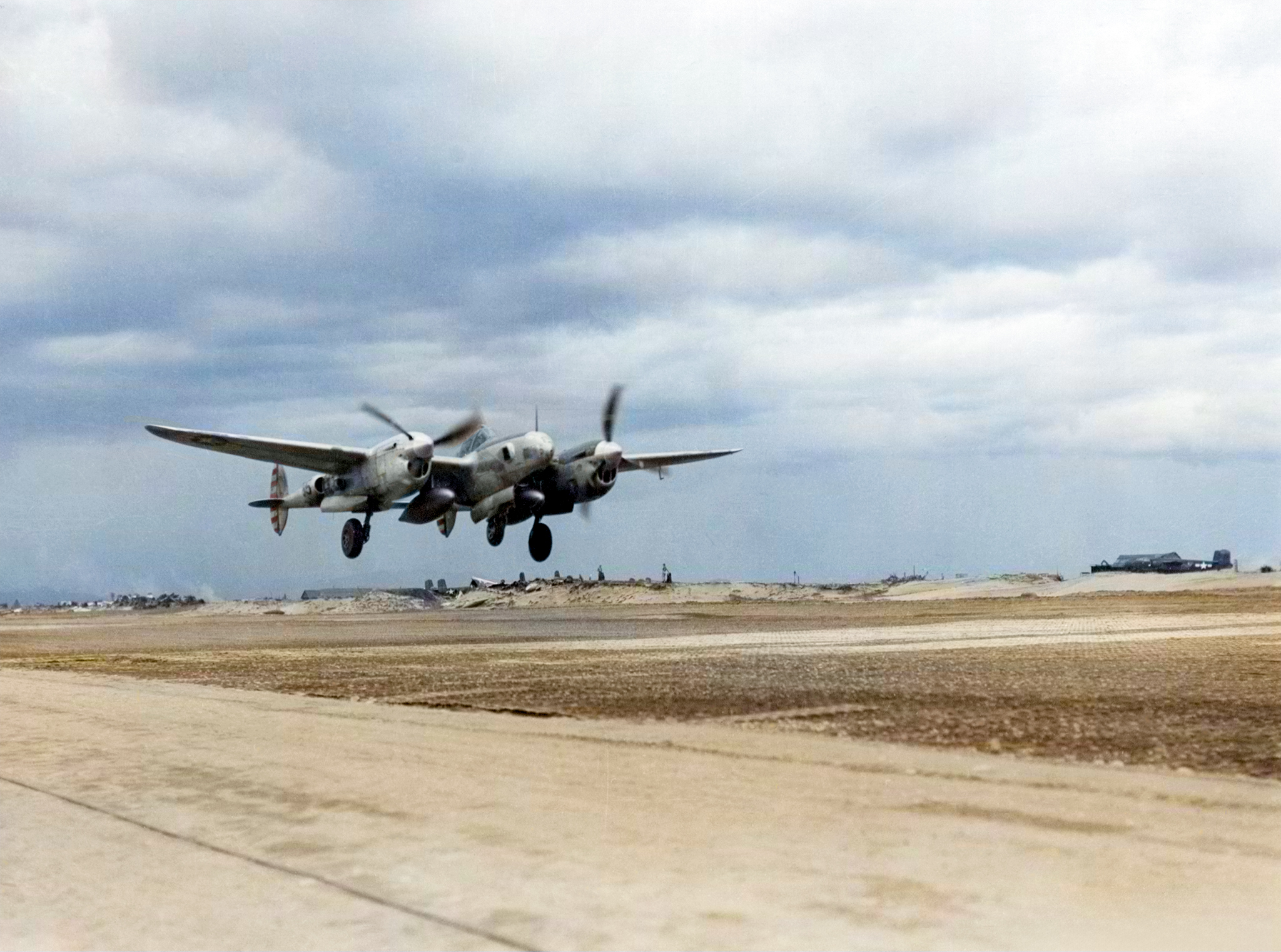 Lockheed F-5 Lightning taking off form Lingayen Airstrip Luzon Philippine for a recon mission over Formosa 17th May 1945 NARA1