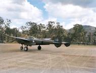 Asisbiz 42 12623 P-38F Lightning 5AF 35FG39FS 16 taxiing at 14 Mile Drome Port Moresby New Guinea 1943 01