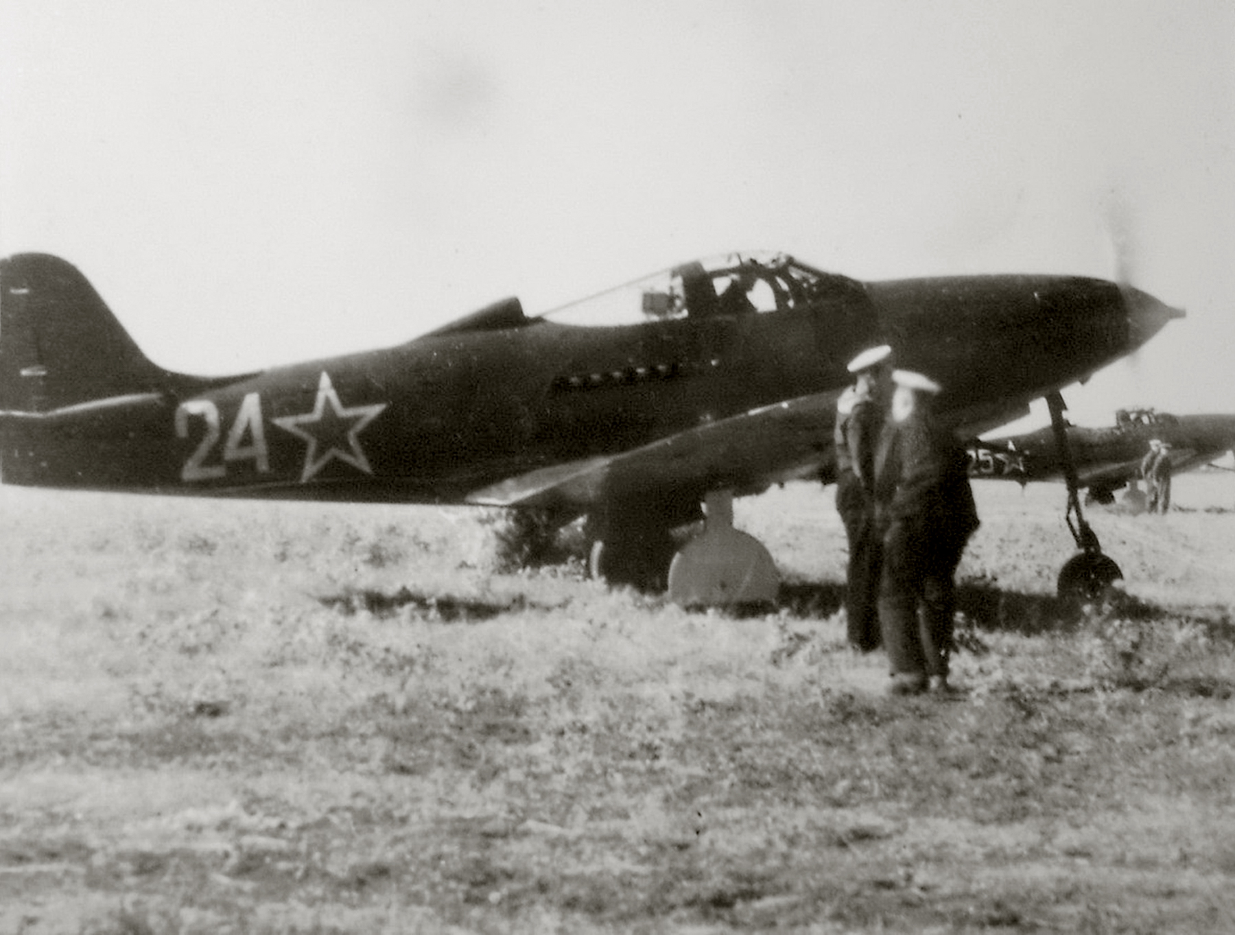 Bell P 39 Airacobra 1MTAD Black Sea Fleet White 24 with 25 at a Soviet airfield Russia 1944 01