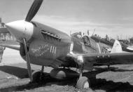 Asisbiz Curtiss P 40F Warhawk 18FG44FS White 111 Jack Bade Destitute Prostitute bogged down Solimans 01