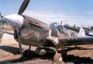 Asisbiz Curtiss P 40F Warhawk 18FG44FS White 111 Jack Bade Destitute Prostitute bogged down Solimans ASC1