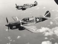 Asisbiz USAAF 41 19825 Curtiss P 40F 347FG68FS White 102 and 41 14102 18FG44FS Guadalcanal Feb 1943 01