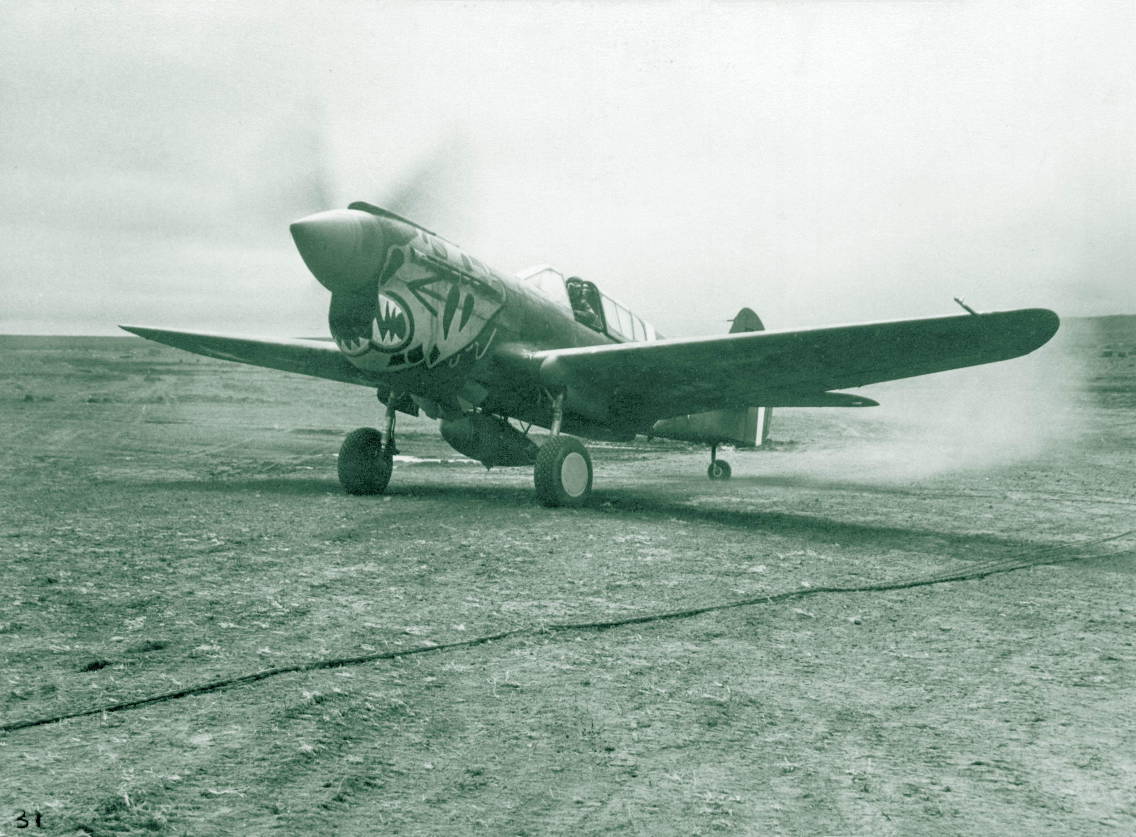 Curtiss P 40E Warhawk 343FG11FS Aleutian Tigers just prior to take off Aleutian Islands 1942 NA1069