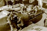 Asisbiz Aircrew American USAAF ground crew from 343FG working on Dell and Flamin Mame 01