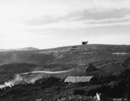 Asisbiz Curtiss P 40E Warhawk 343FG flying low over Kiska Aleutian Islands Umnak Alaska 1943 NA1016