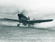 Asisbiz Curtiss P 40E Warhawk 343FG11FS Aleutian Tigers just prior to take off Aleutian Islands 1942 NA1067
