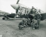 Asisbiz Curtiss P 40E Warhawk 343FG11FS Aleutian Tigers pilots play cards whilst waiting for clearance Aleutian Islands 1942 NA242