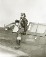 Asisbiz Curtiss P 40E Warhawk 343FG11FS Aleutian Tigers with Lt WD Laine after landing Aleutian Islands 4th Mar 1943 NA019