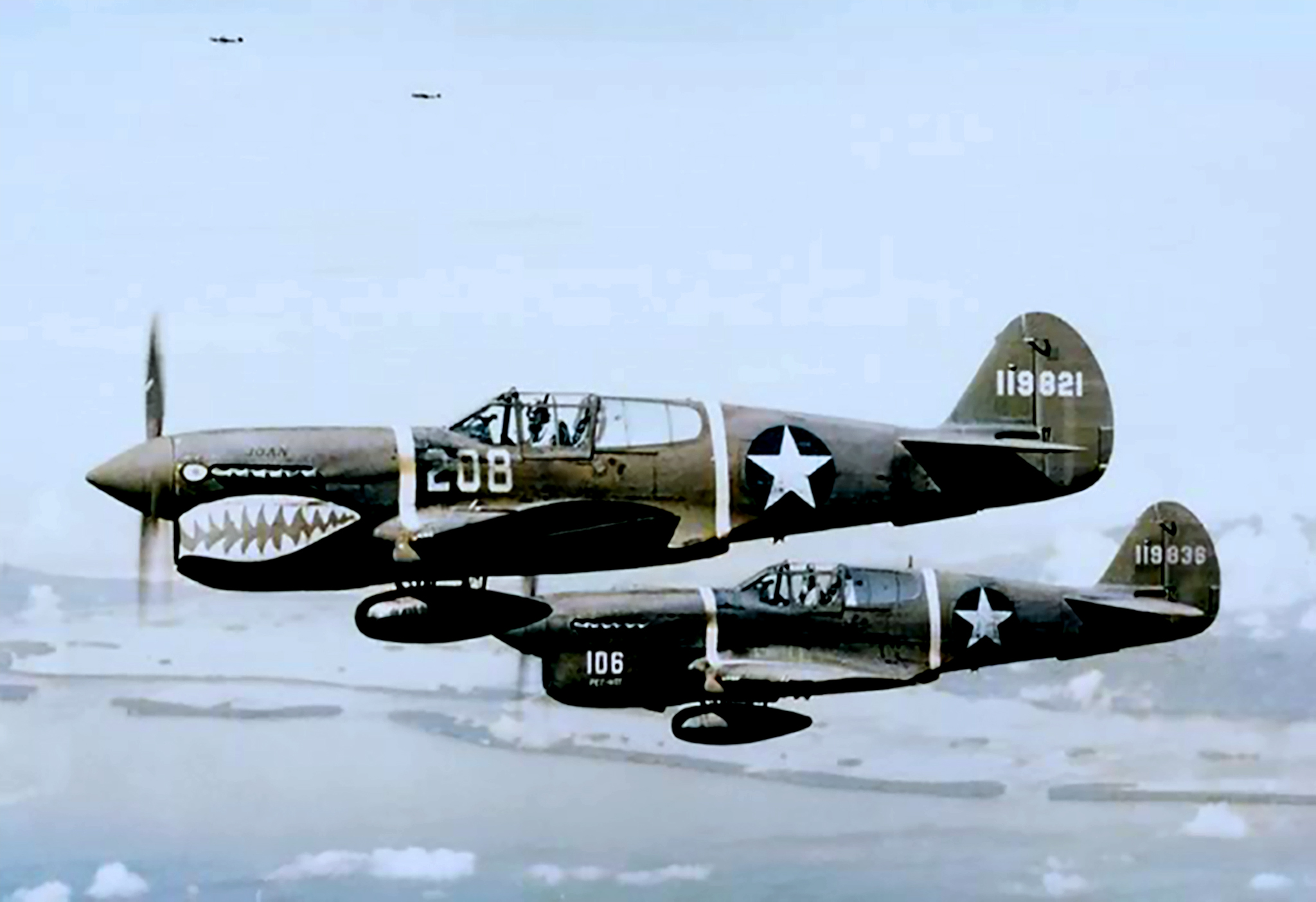 USAAF 41-19821 Curtiss P-40F 347FG68FS White 208 and 41 19836 18FG44FS White 106 Guadalcanal 1943 ASC1