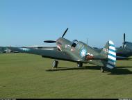 Asisbiz Airworthy warbird Curtiss P 40N Warhawk NZ3009 Flying Tigers 88 08
