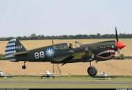 Asisbiz Airworthy warbird Curtiss P 40N Warhawk NZ3009 Flying Tigers 88 10