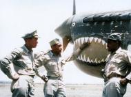 Asisbiz Aircrew 79FG pilots Lt George R Bolling Capt Erwin B Lawrence CO and Capt Leon C Roberts in Italy Sep 1943 NARA1