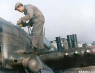 Asisbiz Curtiss P-40 Warhawk 79FG being topped up with oil at Capodichino Italy 1944 01