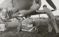 Asisbiz P 40 Warhawk 79FG being armed with a 500lb bomb based at Capodichino Italy 11th Apr 1944 01