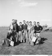 Asisbiz Aircrew RAAF 3Sqn pilots group photo with CV diamond foreground at Italy 1943 AWM MEA0872