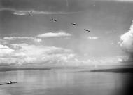 Asisbiz Curtiss P 40N Kittyhawk RAAF 75Sqn group over PNG 04